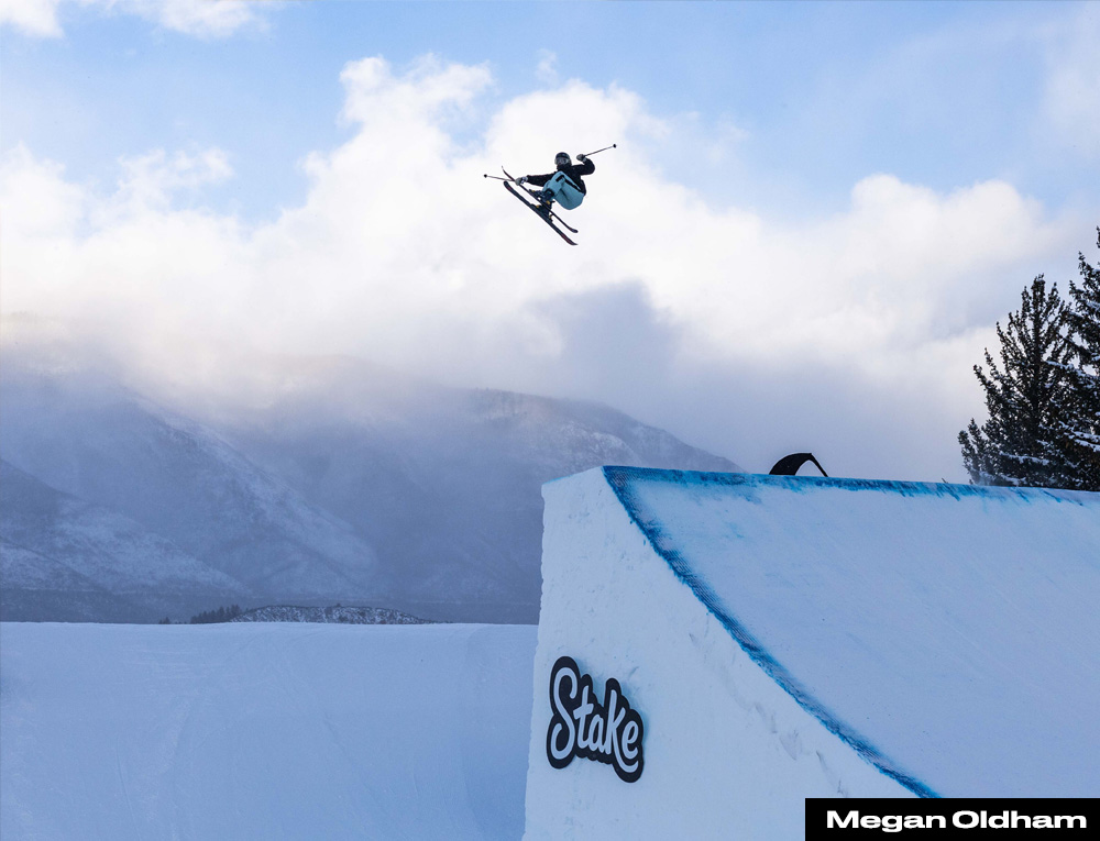 A freestyle skier airborne above a snow feature at X Games Aspen